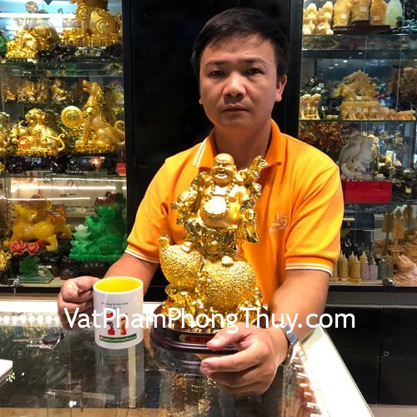Anh Sâm - Khách hàng mua Phật di lạc vàng cầm cành đào vàng ngồi trên túi vàng lớn G152A
