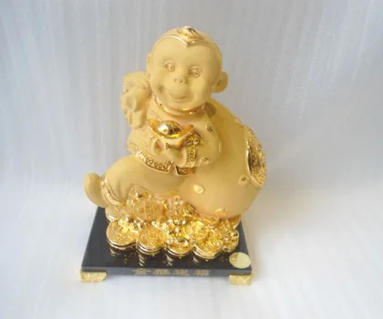 Khỉ tài lộc kéo túi vàng đế thủy tinh - kim hầu tống phước K053M