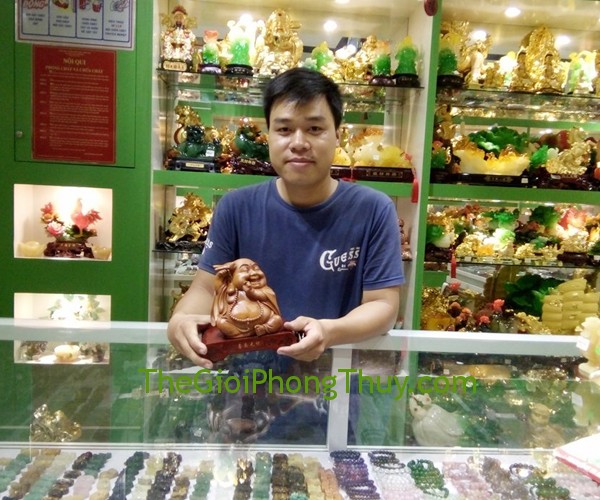 Anh Hùng - Khách mua Phật Di Lặc dáng ngồi FE315